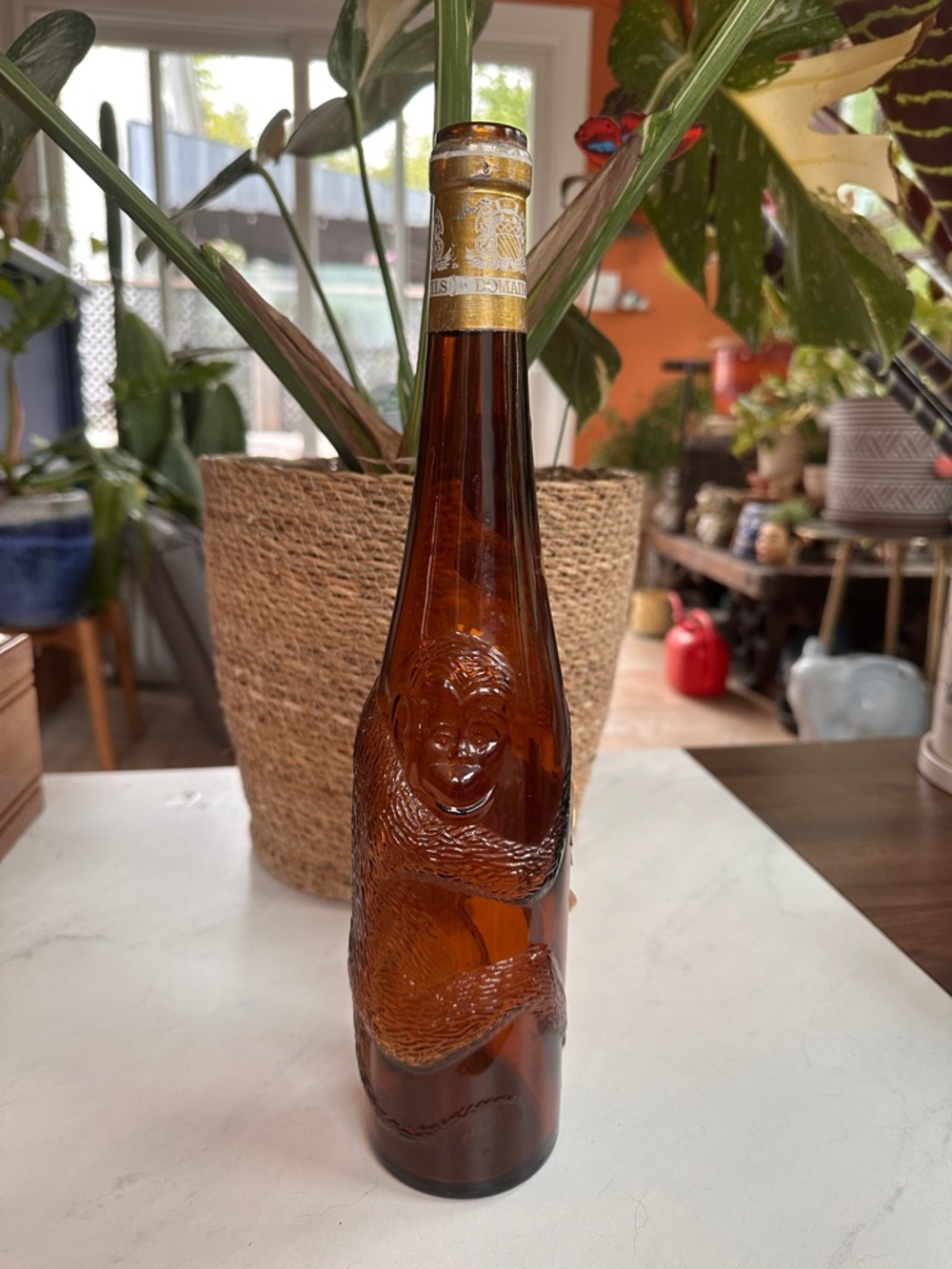 Vintage Amber Glass Bottle with Sculpted Monkey